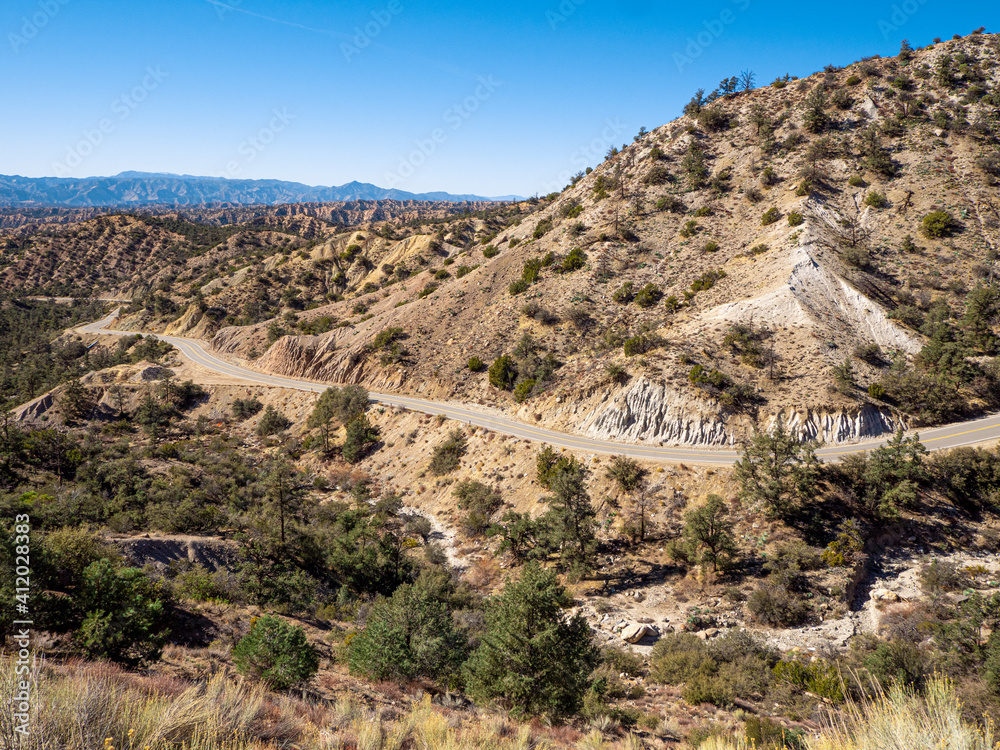 Winding road cutting Through Frazier Park Forest in California Winding road cutting Through Frazier Park Forest in California