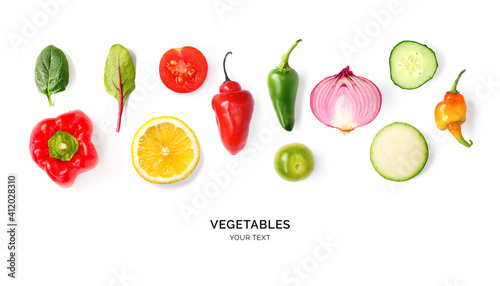 Creative layout made of tomato, onion, pepper, cucumber and zucchini on the white background. Flat lay. Food concept. 