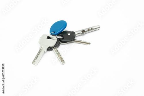 Bunch of keys on white background.