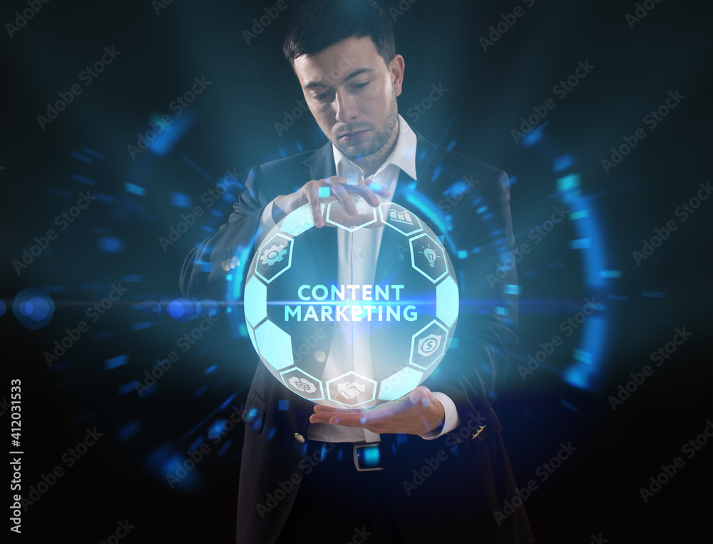 Business, Technology, Internet and network concept. Young businessman working on a virtual screen of the future and sees the inscription: Content marketing Business, Technology, Internet and network concept. Young businessman working on a virtual screen of the future and sees the inscription: Content marketing