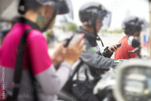smartphone use by driver on street motorcycle