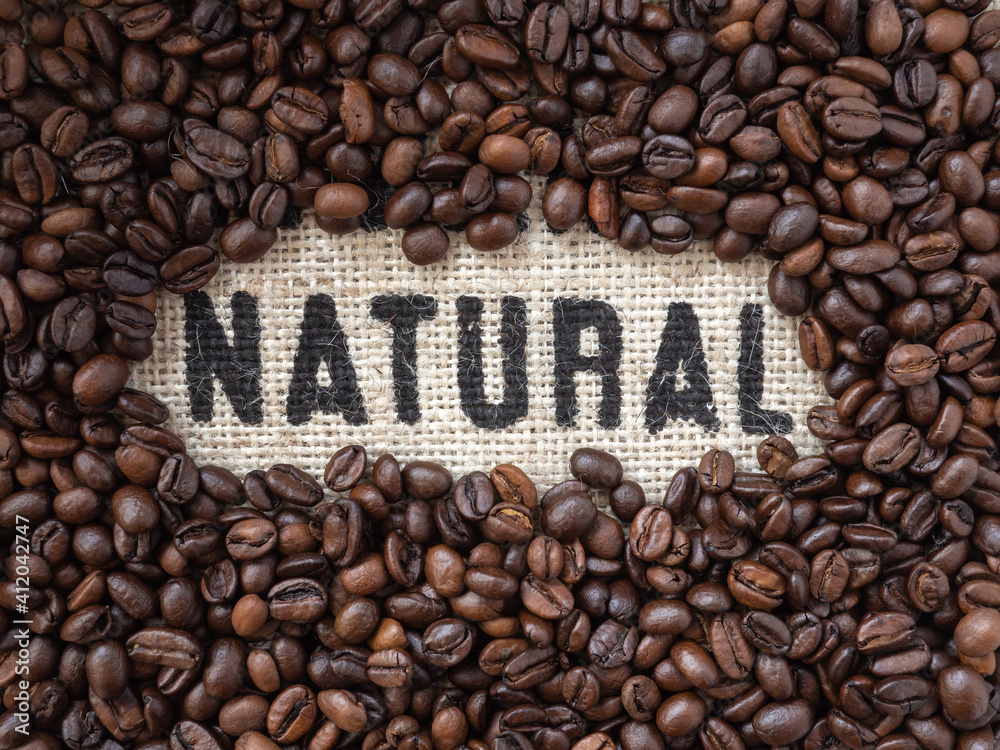 Background made of coffee beans with message Background made of coffee beans with message
