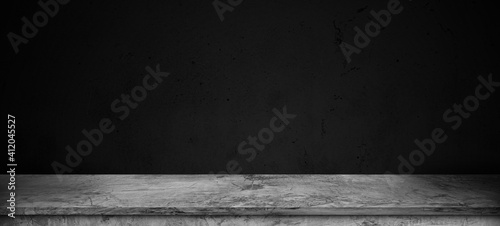 Concrete shelf table with black cement wall. Use as montage for product display