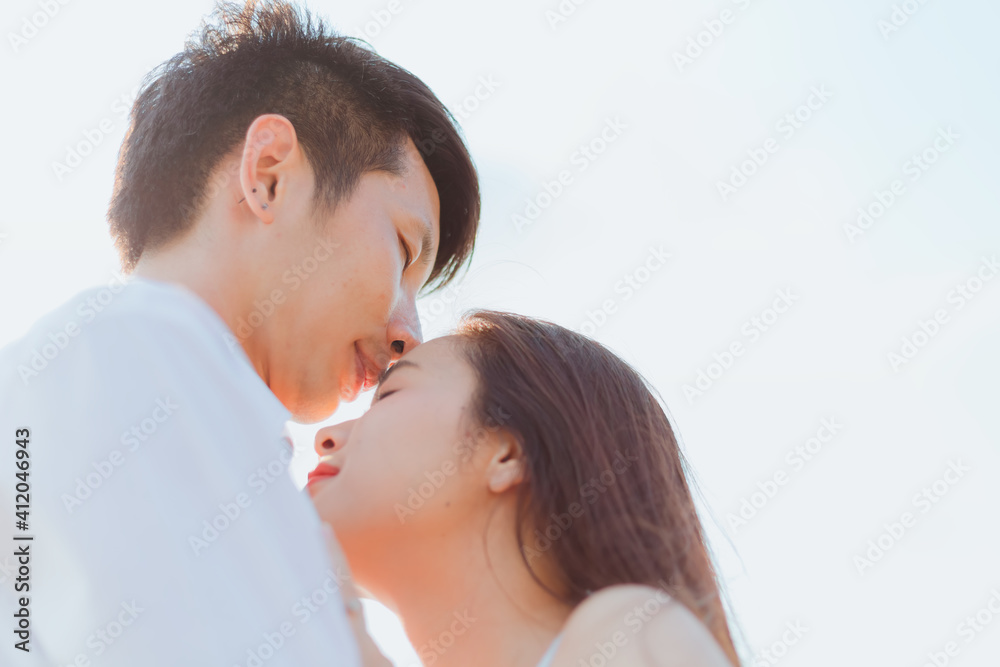 romantic time loving couple kissing on the beach. Love travel concept. romantic time loving couple kissing on the beach. Love travel concept.