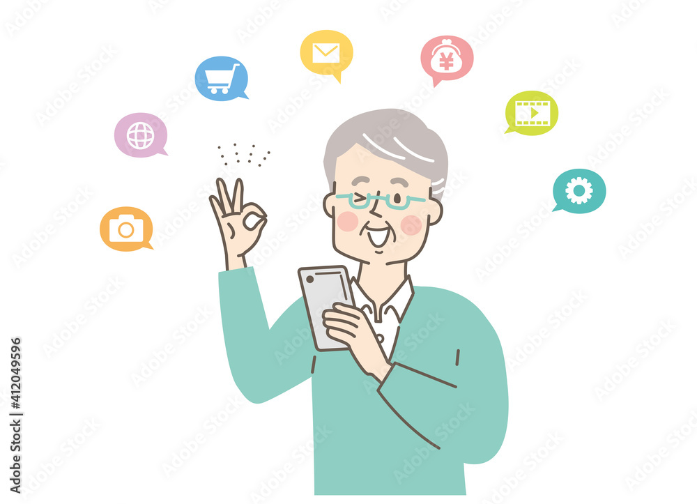 スマホを使うシニア男性 スマホを使うシニア男性