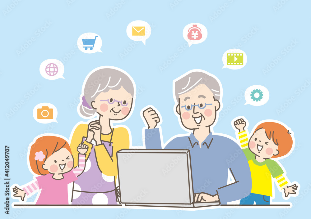 笑顔の3世代家族とパソコン