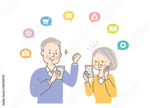 スマホを使用するシニア女性と男性