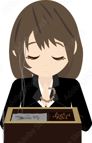 お焼香する女性