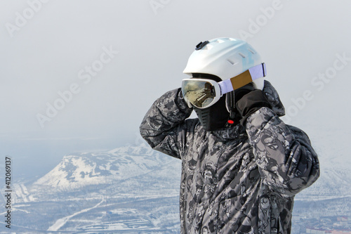Snowboarder at the top of the mountain
