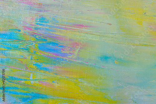 Abstract creative background: chaotic stains of oil paint on linen canvas with tonal priming