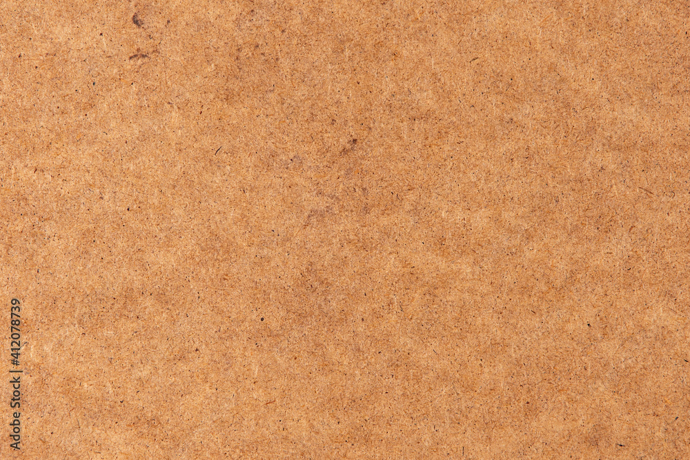 Fototapeta premium wood background: light brown pressed wood fiber board. hdf stove