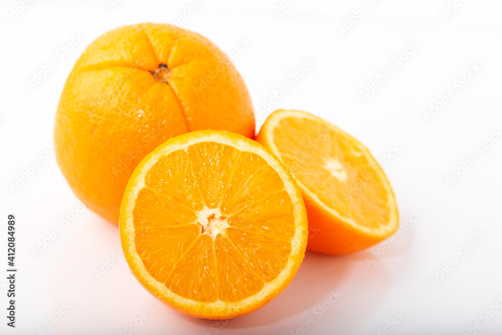 Fresh orange fruit on a white background