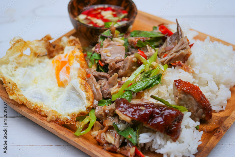 Stir fried duck with chilli and basil, Thai spicy food Stir fried duck with chilli and basil, Thai spicy food