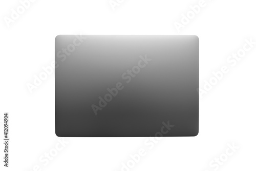 Gray metallic laptop closed isolated on white. Communication network. Silver metal surface. Digital modern communication. Computer technology.