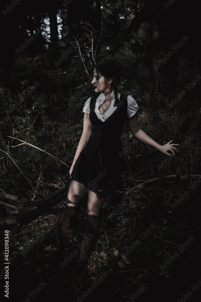 Witch in the form of a student in the forest Witch in the form of a student in the forest