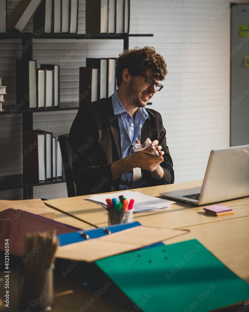 anxious caucasian businessman sitting in the office with crumpled paper in his hand. Frustrated and unhappy expression. Business and financial problem concept anxious caucasian businessman sitting in the office with crumpled paper in his hand. Frustrated and unhappy expression. Business and financial problem concept