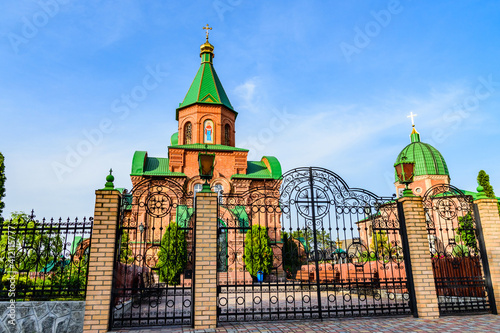Orthodox church in village Kamiani Potoky, Ukraine. Church of the Blessed Virgin Mary intercession (Pokrovsky temple) photo