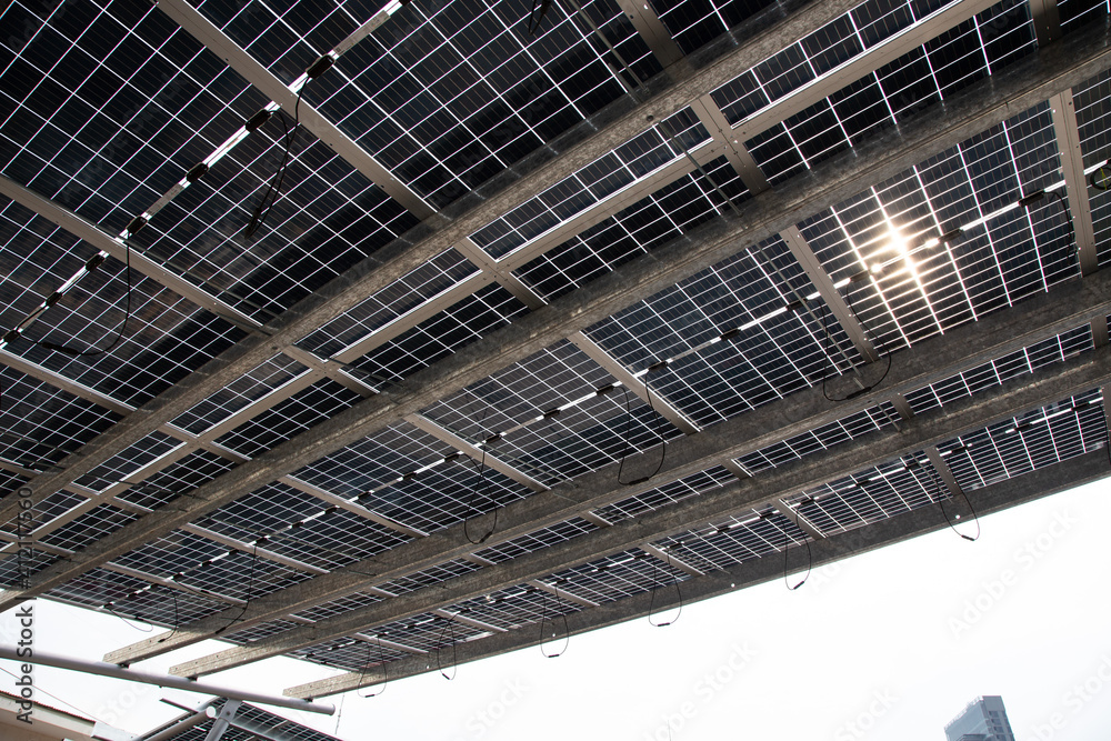 Solar Cell (Photovoltaic Cell) Panels installing on Rooftop of public car park in Bangkok