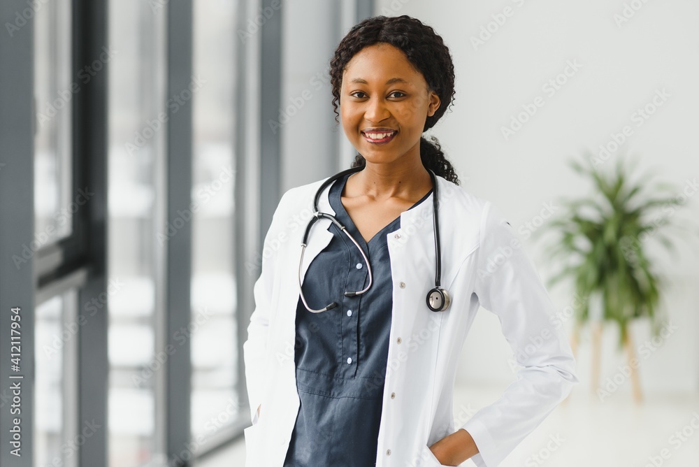 beautiful african american nurse with arms folded beautiful african american nurse with arms folded