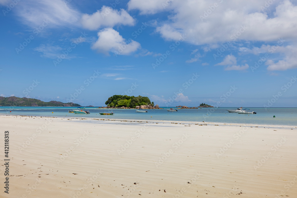 View of Chauve Souris Relais island from Cote D'or beach on Praslin Island, Seychelles View of Chauve Souris Relais island from Cote D'or beach on Praslin Island, Seychelles