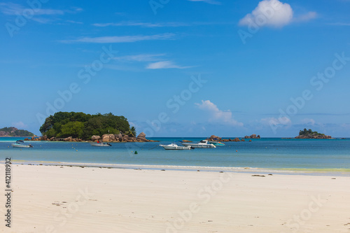 View of Chauve Souris Relais island from Cote D'or beach on Praslin Island, Seychelles © hyserb