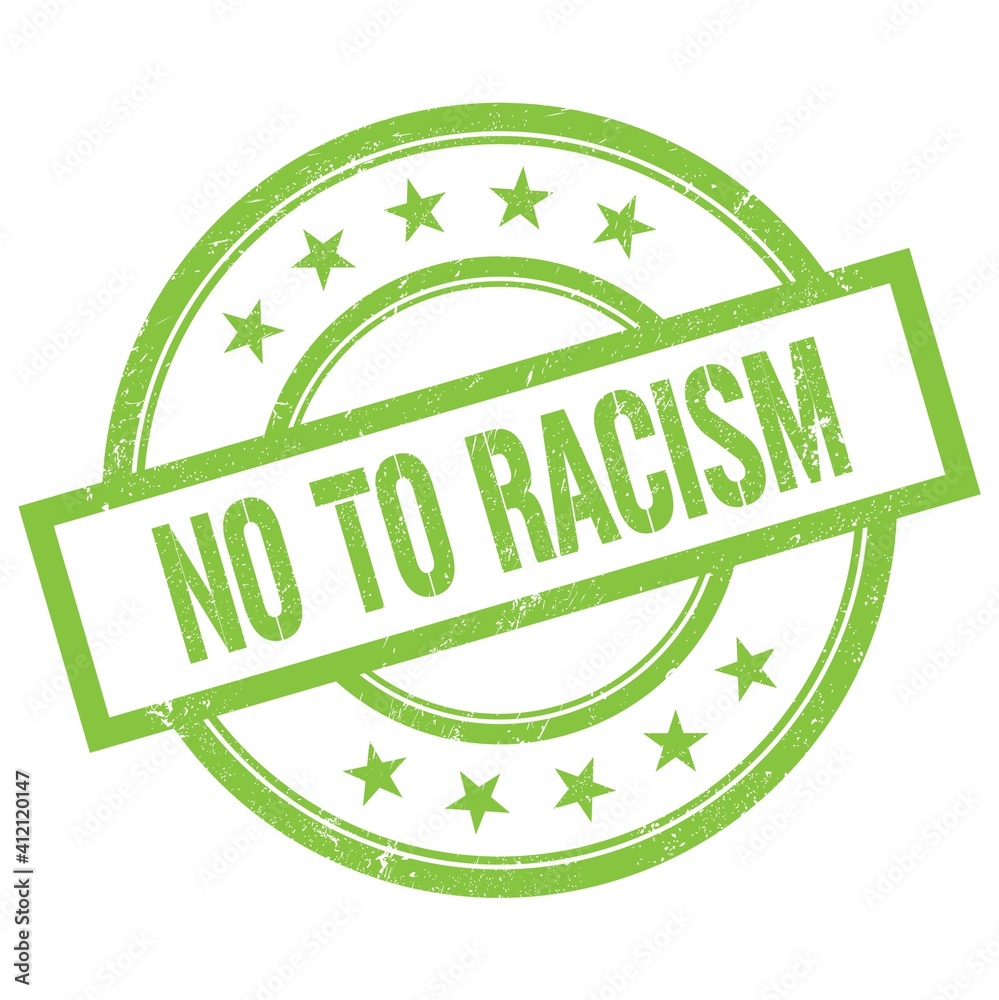 NO TO RACISM text written on green vintage stamp.