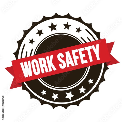WORK SAFETY text on red brown ribbon stamp.