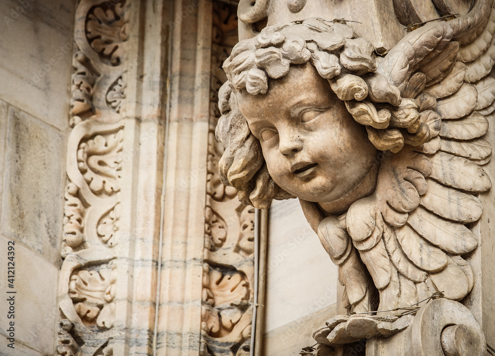 Fototapeta premium Main Christian Catholic church on Piazza di Duomo in center of Milan,Italy.Main tourist landmark in Lombardia,Milano.Ancient Italian cathedral built from white marble stone