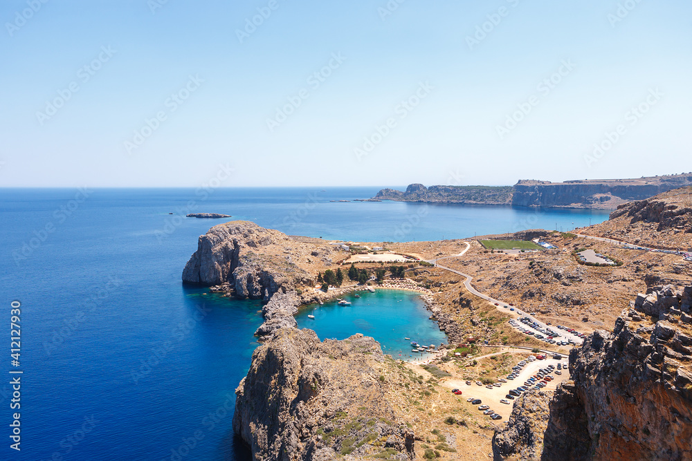 Beautiful view of the bay and the sea from the ancient ruins of the city of Lindos on the island of Rhodes Greece. Beautiful view of the bay and the sea from the ancient ruins of the city of Lindos on the island of Rhodes Greece.