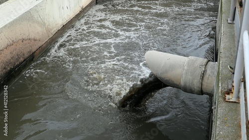 Sewage Farm Waste Water Flowing From Pipe