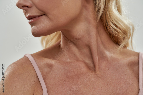 Close up view of middle aged caucasian woman chin