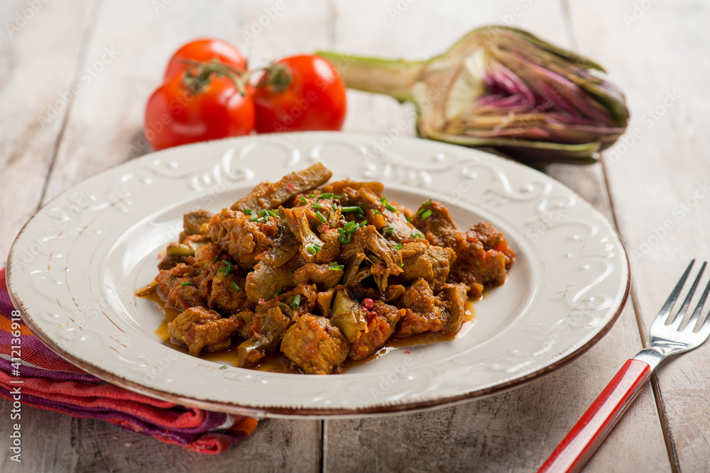 veal stew with hartichoke and tomato sauce veal stew with hartichoke and tomato sauce
