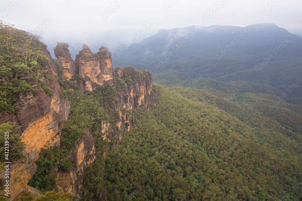 Classic landscape view of the Three Sisters rock formation near Katoomba above the Jamison Valley in the Blue Mountains National Park in NSW, Australia.