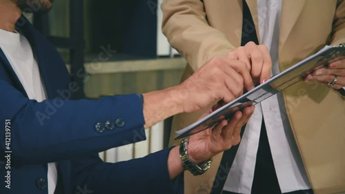 Business people working on desk review document contract and using pen to sign signature in workplace office room