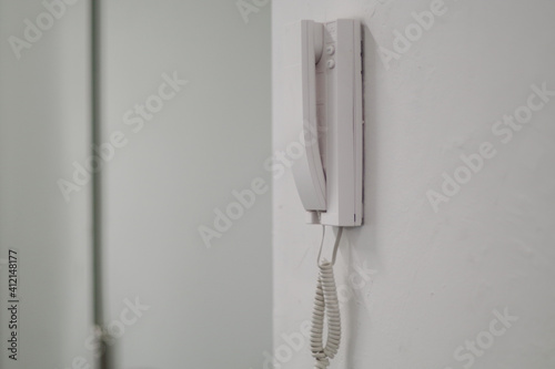 A White Phone on the Wall, at Office