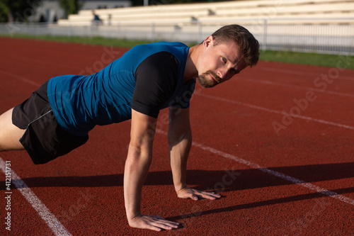 Strong man doing push ups