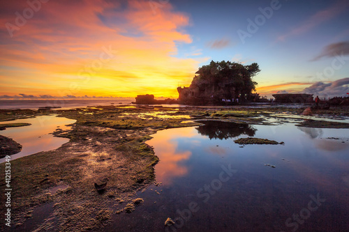 Tanah Lot Temple in sunset time, the most famous temple on the sea at Bali island, Indonesia