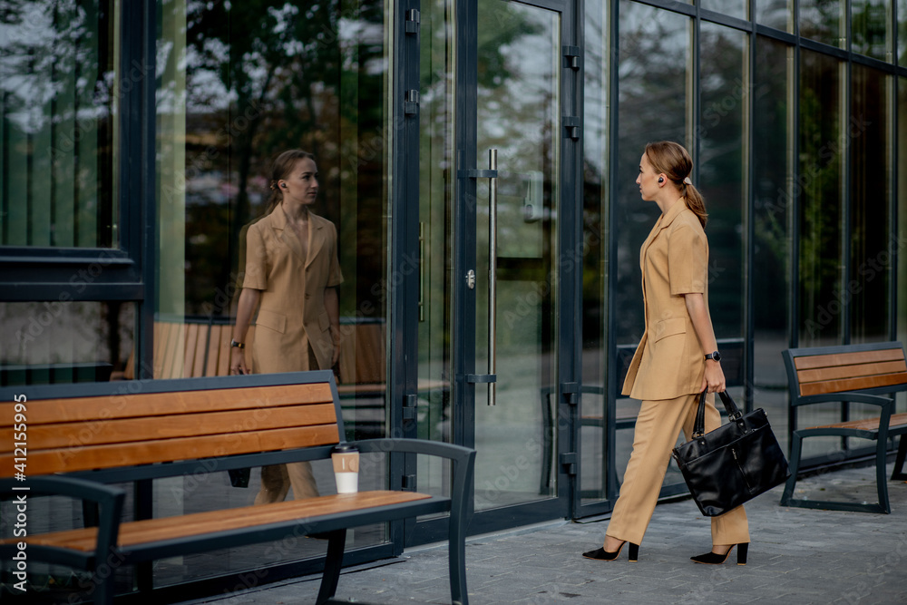 Business Women Style. Woman with Briefcase Going To Work. Portrait Of Beautiful Smiling Female In Stylish Office Clothes. High Resolution.