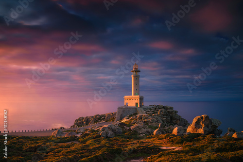 Punta Nariga lighthouse at dusk. Malpica, Galicia, Spain