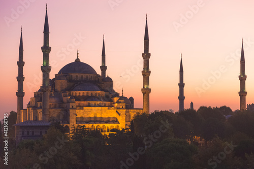 The iconic Ottoman-era Blue Mosque at Sultanahmet in Fatih, Istanbul, Turkey at sunset or sunrise.