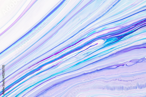 Fluid art texture. Abstract backdrop with iridescent paint effect. Liquid acrylic picture with artistic mixed paints. Can be used for baner or wallpaper. Blue, turquoise and white overflowing colors