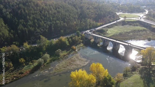 Aerial view of Nineteenth-century bridge over the Yantra River, known as the Kolyu Ficheto Bridge in Byala, Ruse region, Bulgaria photo