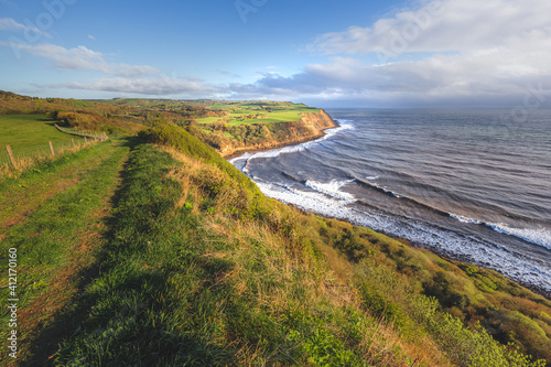 North Yorkshire coastline landscape and seascape with dramatic cliffs along Cleveland Way from Burniston to Hayburn Wyke in North York Moors National Park  England.