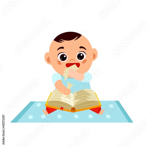 Baby boy and a book