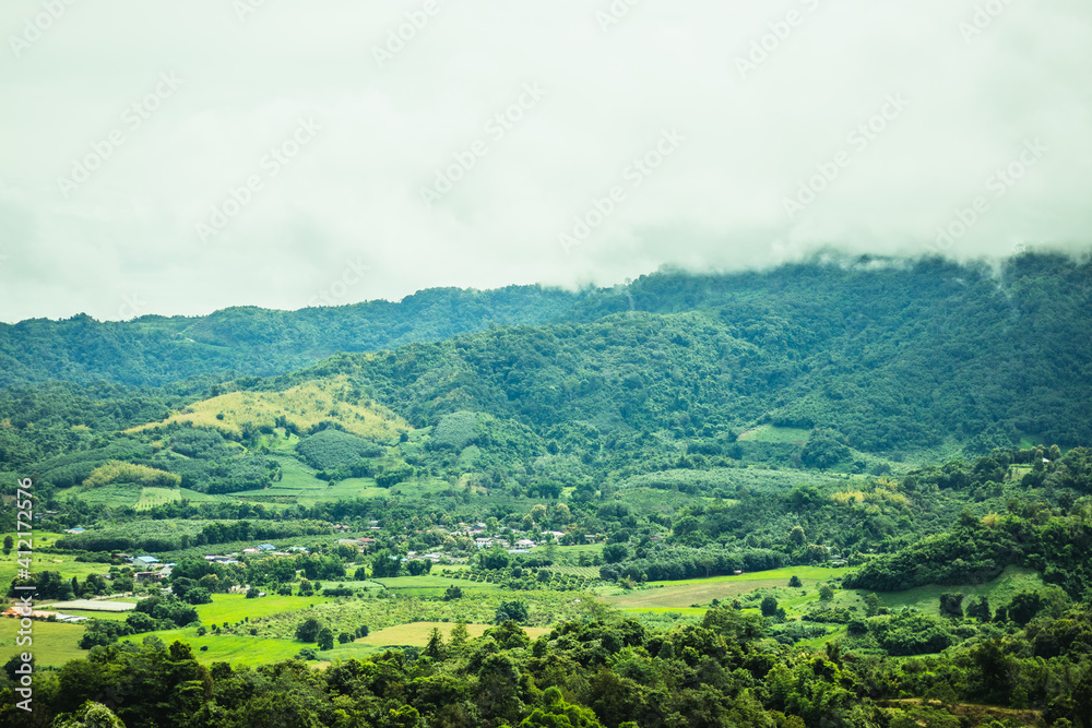 Fog is passing through the mountains of northern Thailand in the rainy season. Fog is passing through the mountains of northern Thailand in the rainy season.