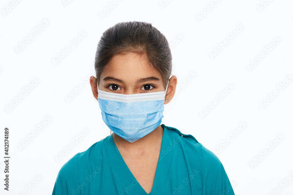 Asian child girl with a surgical protective face mask during a global pandemic, isolated on white Asian child girl with a surgical protective face mask during a global pandemic, isolated on white