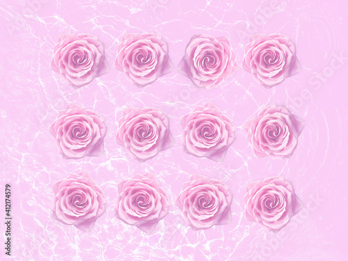 Flowers of pink roses arranged in rows on a pink background with streaks of water.