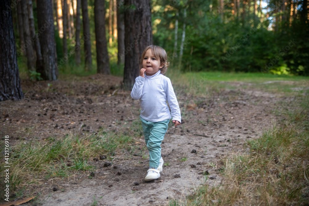 adorable toddler walks in the woods adorable toddler walks in the woods