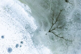 Aerial view of frozen lake. Aerial photography during winter season.