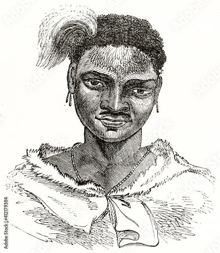 portrait close up of a Cafres man, african features guy with a feather on his hairs. Ancient grey tone etching style art by unidentified author, Magasin Pittoresque, 1838